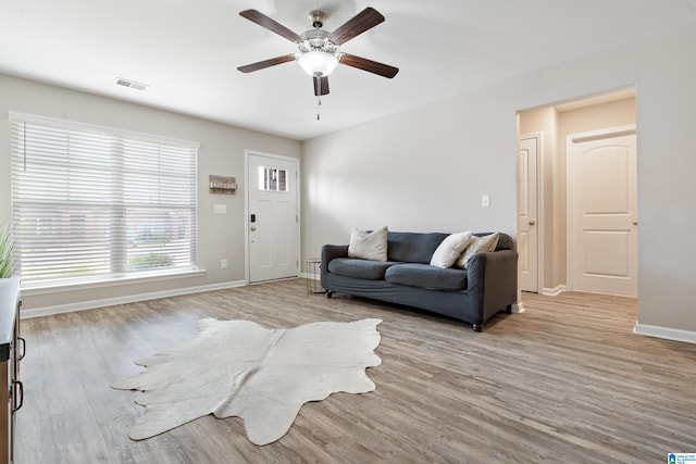 6106 Townley Ct, Mccalla, AL 35111 - living room featuring light wood finished floors, visible vents, and ceiling fan