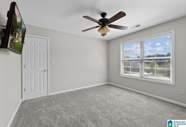 88 Glen Trce, Springville, AL 35146 - unfurnished room with visible vents, baseboards, a ceiling fan, and carpet