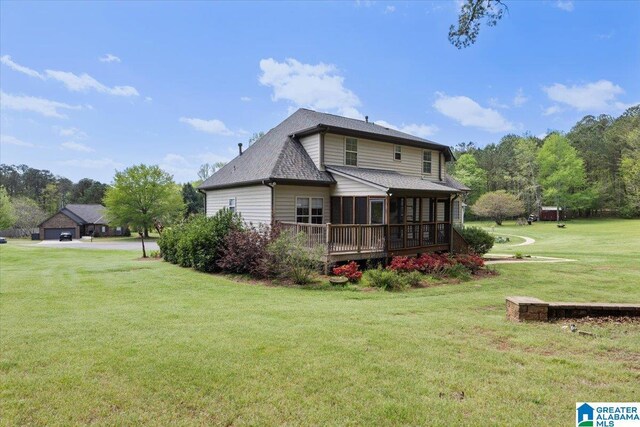 88 Glen Trce, Springville, AL 35146 - back of property featuring a yard and a shingled roof