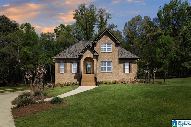 88 Glen Trce, Springville, AL 35146 - view of front of property featuring brick siding, a front lawn, and a shingled roof