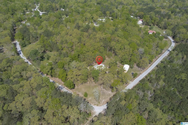 drone / aerial view with a forest view