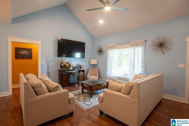 living area with wood finished floors, a ceiling fan, and high vaulted ceiling