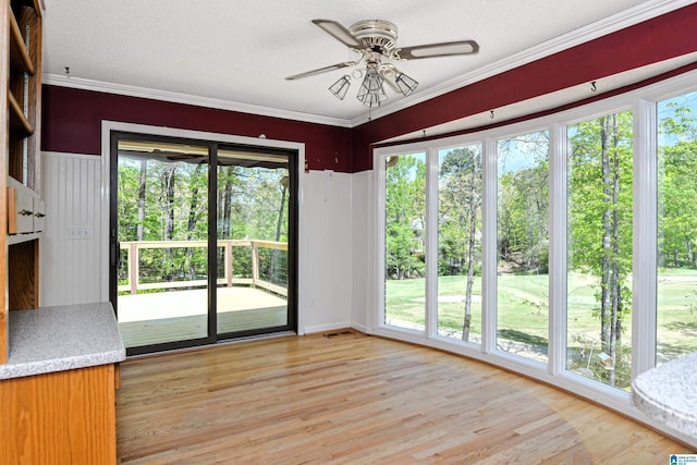5000 Cameron Rd, Birmingham, AL 35242 - unfurnished dining area with light wood-type flooring, a ceiling fan, and crown molding