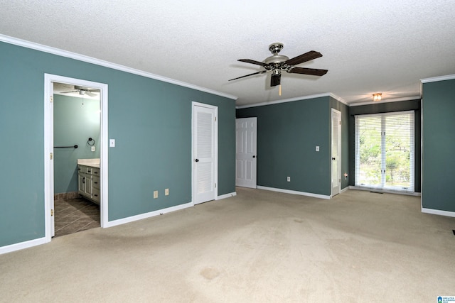 5000 Cameron Rd, Birmingham, AL 35242 - unfurnished bedroom with light carpet, ornamental molding, a textured ceiling, and baseboards