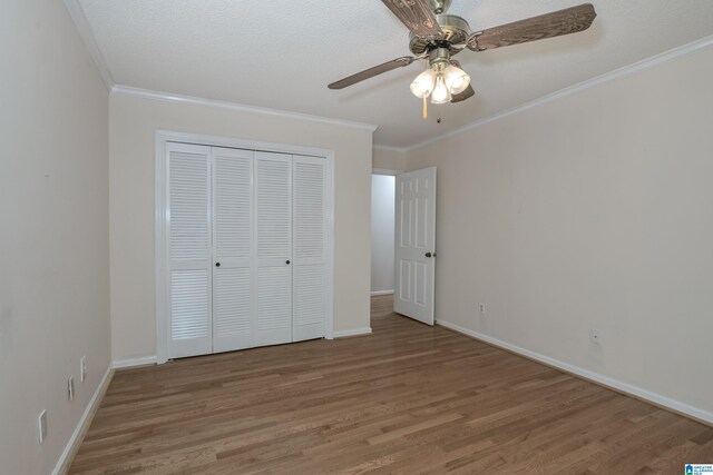 5000 Cameron Rd, Birmingham, AL 35242 - unfurnished bedroom featuring crown molding, wood finished floors, and a closet