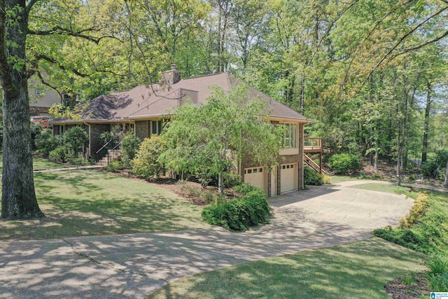 5000 Cameron Rd, Birmingham, AL 35242 - view of front of house with a chimney, stairs, an attached garage, driveway, and brick siding