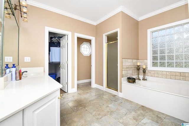 bathroom featuring a shower stall, vanity, a bath, and ornamental molding