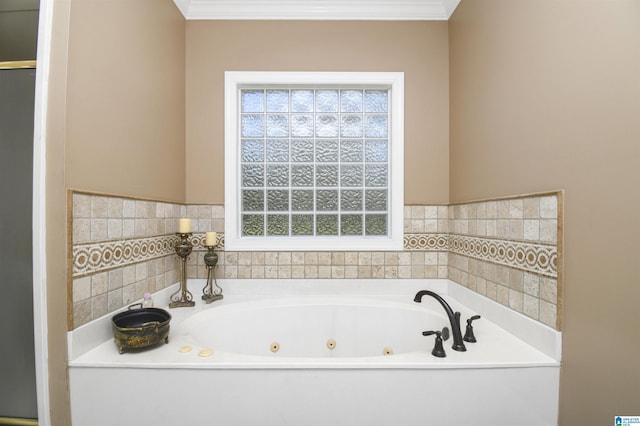 bathroom featuring a whirlpool tub and ornamental molding