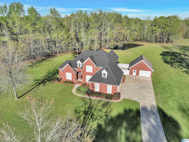 drone / aerial view with a view of trees