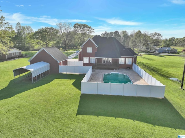 exterior space with a fenced backyard, a fenced in pool, and a lawn