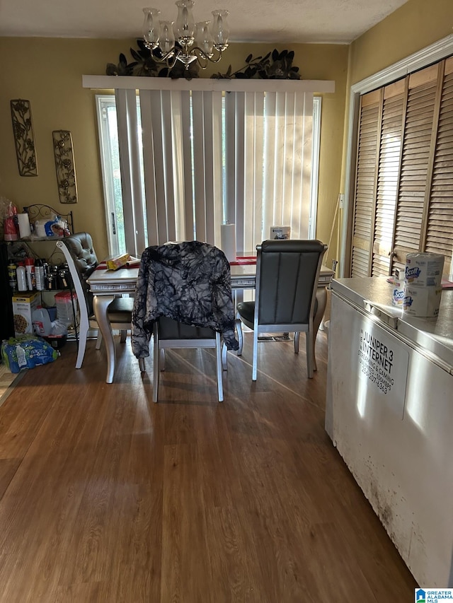 385 Cloverdale Dr, Sylacauga, AL 35150 - dining area with a chandelier and wood finished floors