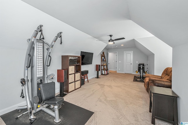 workout area featuring carpet flooring, baseboards, vaulted ceiling, and ceiling fan