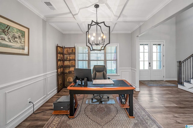 office area featuring visible vents, an inviting chandelier, beam ceiling, wood finished floors, and coffered ceiling