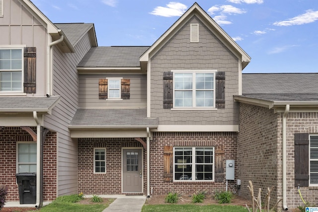 view of front of property featuring brick siding
