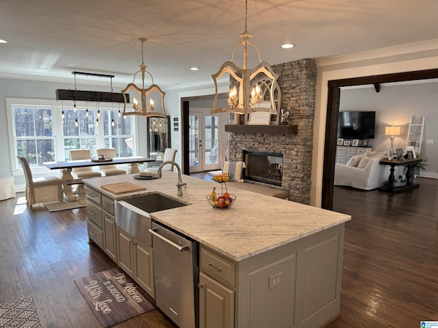 672 Kent Dairy Rd, Alabaster, AL 35007 - kitchen with dishwasher, open floor plan, a notable chandelier, and a sink