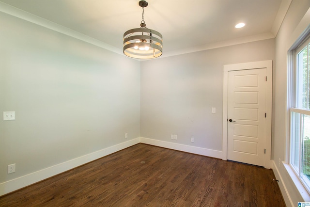 672 Kent Dairy Rd, Alabaster, AL 35007 - empty room featuring a chandelier, baseboards, dark wood-type flooring, and ornamental molding