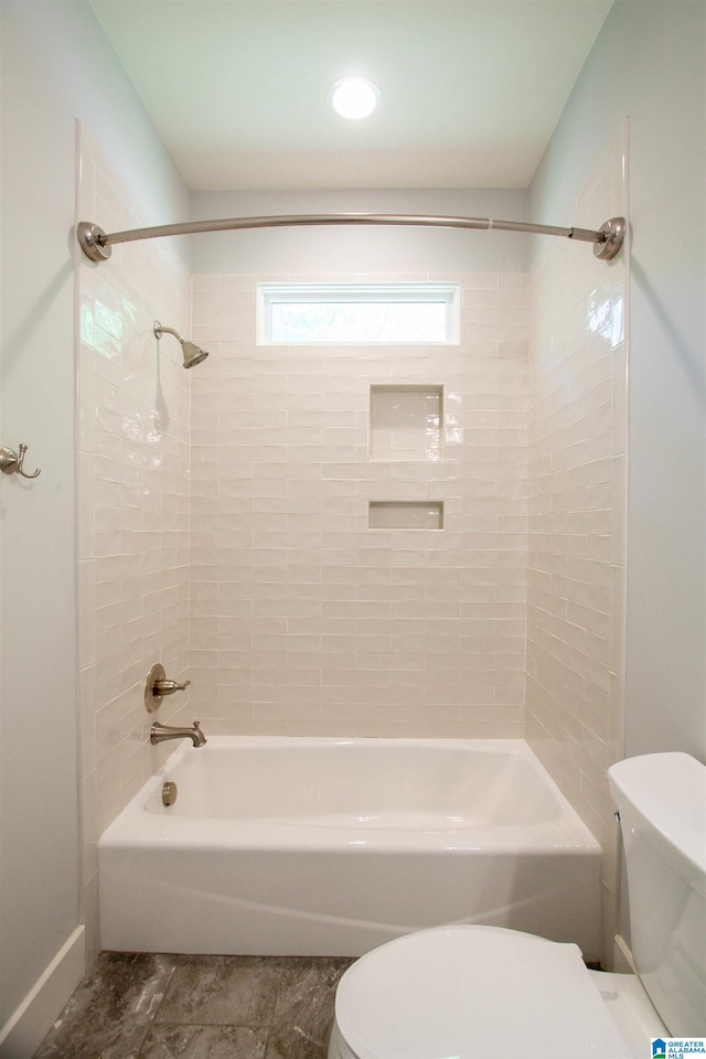 672 Kent Dairy Rd, Alabaster, AL 35007 - bathroom featuring shower / bathing tub combination, baseboards, and toilet