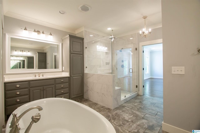 672 Kent Dairy Rd, Alabaster, AL 35007 - bathroom featuring a shower stall, an inviting chandelier, crown molding, baseboards, and a bathtub