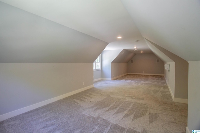 672 Kent Dairy Rd, Alabaster, AL 35007 - additional living space featuring recessed lighting, vaulted ceiling, baseboards, and light carpet