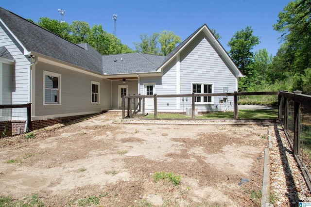672 Kent Dairy Rd, Alabaster, AL 35007 - rear view of house with roof with shingles, fence, and a ceiling fan