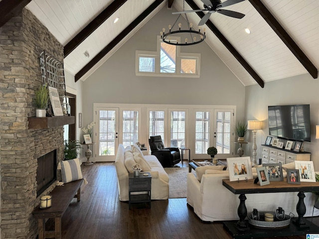 672 Kent Dairy Rd, Alabaster, AL 35007 - living room featuring a stone fireplace, a ceiling fan, hardwood / wood-style flooring, beam ceiling, and high vaulted ceiling