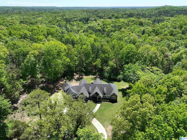 672 Kent Dairy Rd, Alabaster, AL 35007 - drone / aerial view with a wooded view