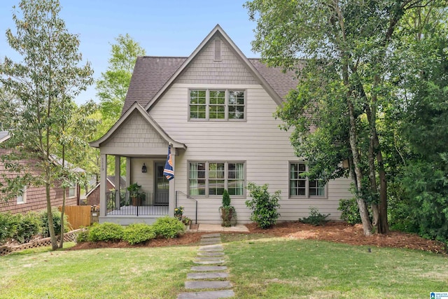 1119 Crest Ave, Homewood, AL 35209 - view of front of house with a shingled roof and a front lawn