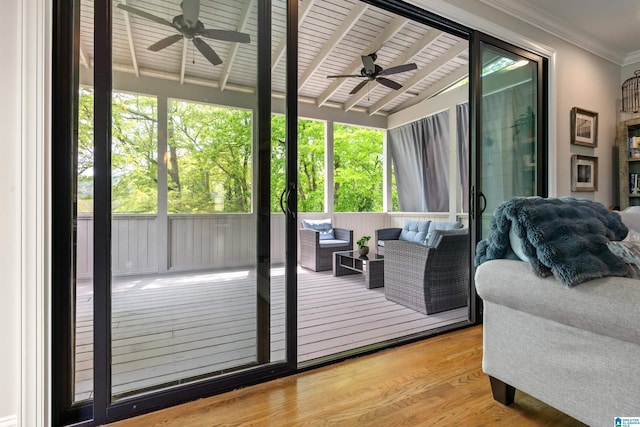 1119 Crest Ave, Homewood, AL 35209 - doorway to outside with crown molding, beam ceiling, a ceiling fan, and wood finished floors