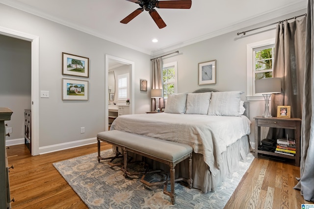 1119 Crest Ave, Homewood, AL 35209 - bedroom featuring multiple windows, crown molding, and wood finished floors
