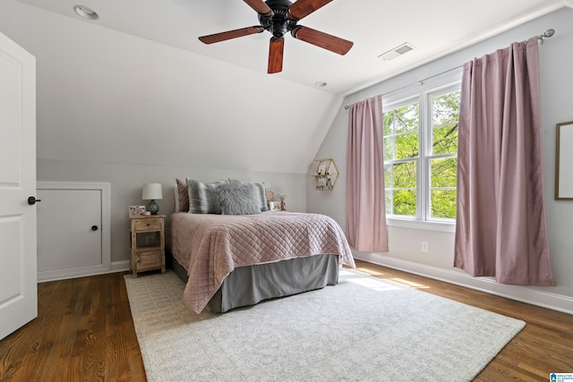 1119 Crest Ave, Homewood, AL 35209 - bedroom with a ceiling fan, vaulted ceiling, visible vents, wood finished floors, and baseboards