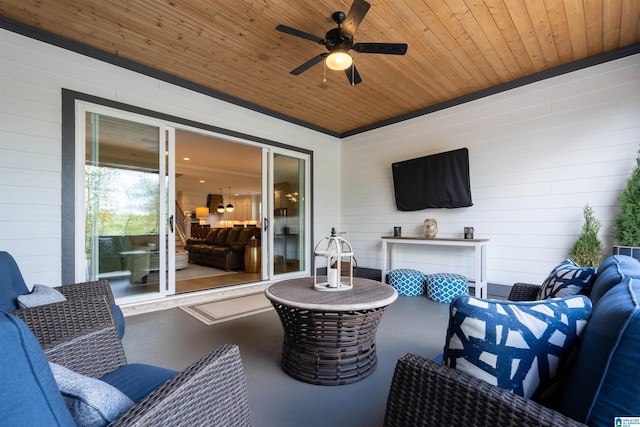 view of patio featuring ceiling fan