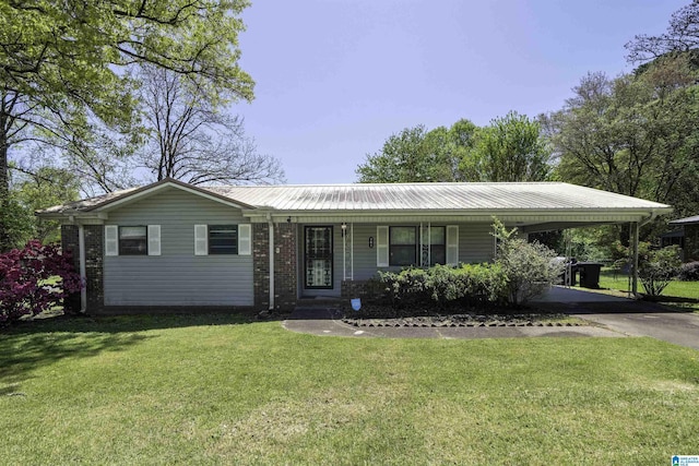 701 11th Pl, Pleasant Grove, AL 35127 - single story home with a front lawn, an attached carport, aphalt driveway, brick siding, and metal roof