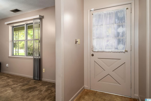 701 11th Pl, Pleasant Grove, AL 35127 - doorway featuring dark carpet and baseboards