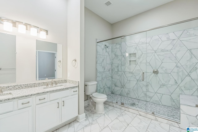 bathroom with a shower stall, visible vents, marble finish floor, and a sink