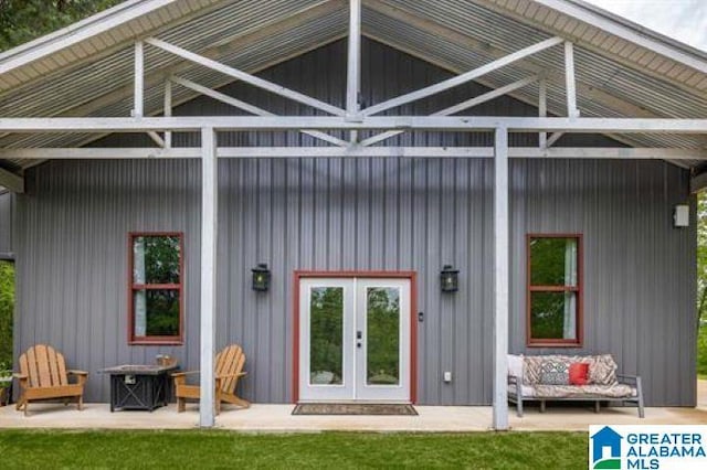 back of house with french doors and a patio