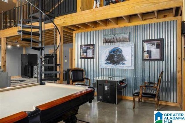 recreation room featuring baseboards, pool table, and finished concrete flooring