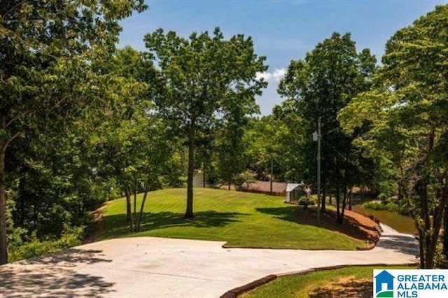 surrounding community with a yard