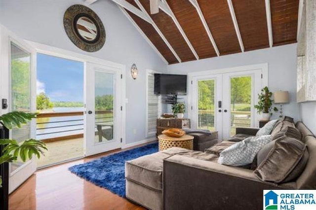 sunroom / solarium with french doors and beam ceiling