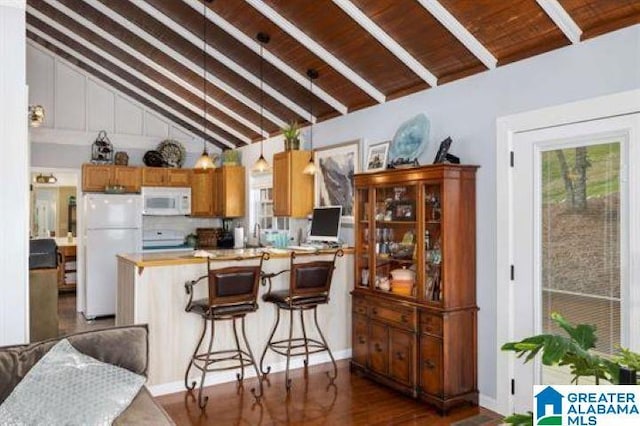 kitchen with wooden ceiling, a peninsula, vaulted ceiling with beams, and white appliances