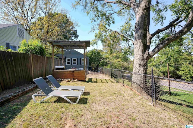 view of yard featuring a fenced backyard