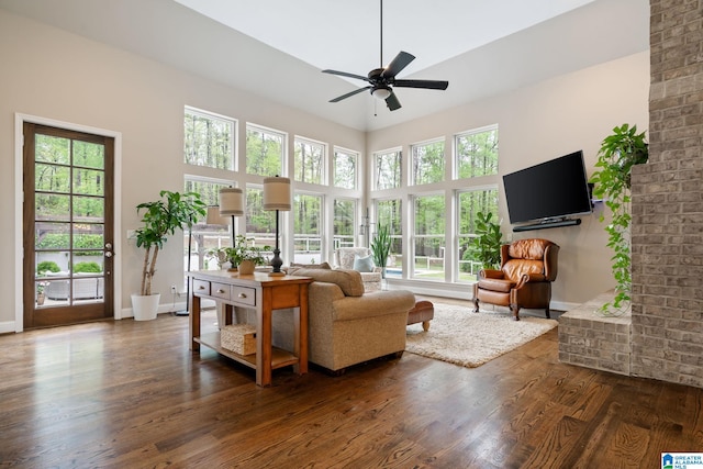 5448 Palomino Trl, Birmingham, AL 35242 - living room featuring baseboards, a high ceiling, wood finished floors, and ceiling fan