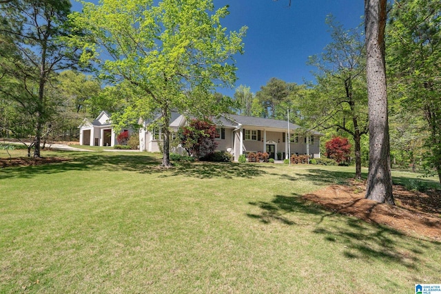 5448 Palomino Trl, Birmingham, AL 35242 - view of front of home with a porch and a front lawn