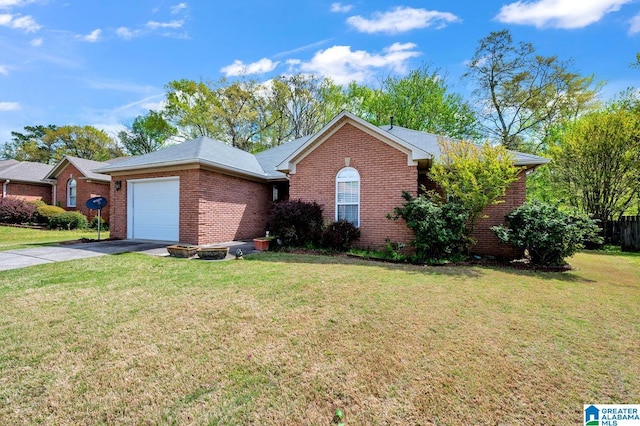 view of front of home featuring concrete driveway, a garage, a front yard, and brick siding