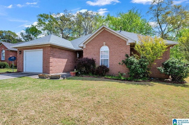view of front of home featuring a garage, concrete driveway, a front lawn, and brick siding