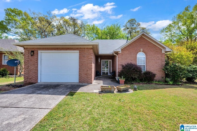 single story home with an attached garage, concrete driveway, a front yard, and brick siding