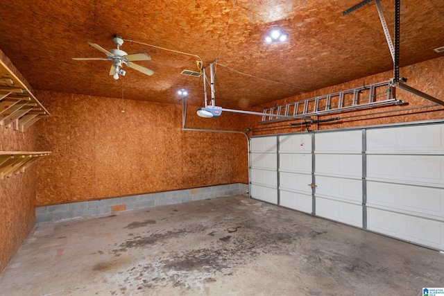 garage featuring visible vents, a garage door opener, and ceiling fan