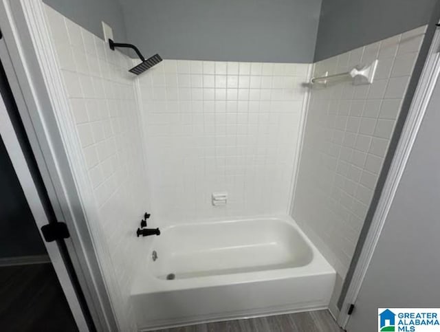 438 Henry St, Birmingham, AL 35214 - bathroom with tub / shower combination and wood finished floors