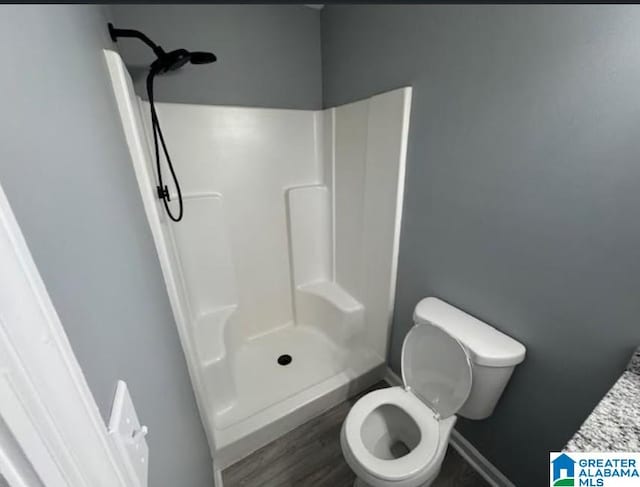 438 Henry St, Birmingham, AL 35214 - full bath with toilet, baseboards, and walk in shower