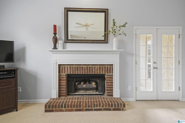 details featuring french doors, baseboards, and a fireplace