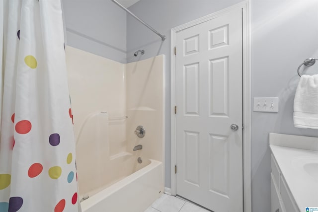 bathroom featuring tile patterned floors, vanity, and shower / bath combination with curtain